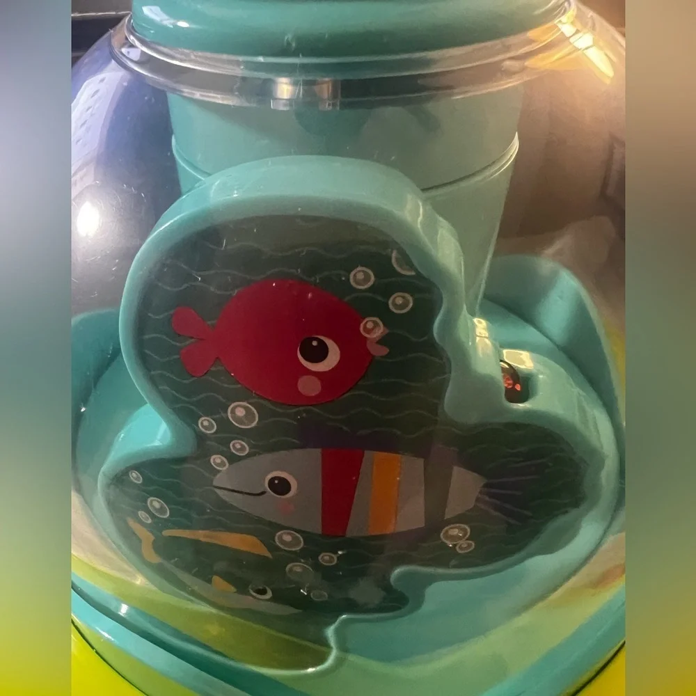BRIGHT STARS PRESS AND GLOW SPINNER.  EVERY PUSH MAKES THE STARS GLOW